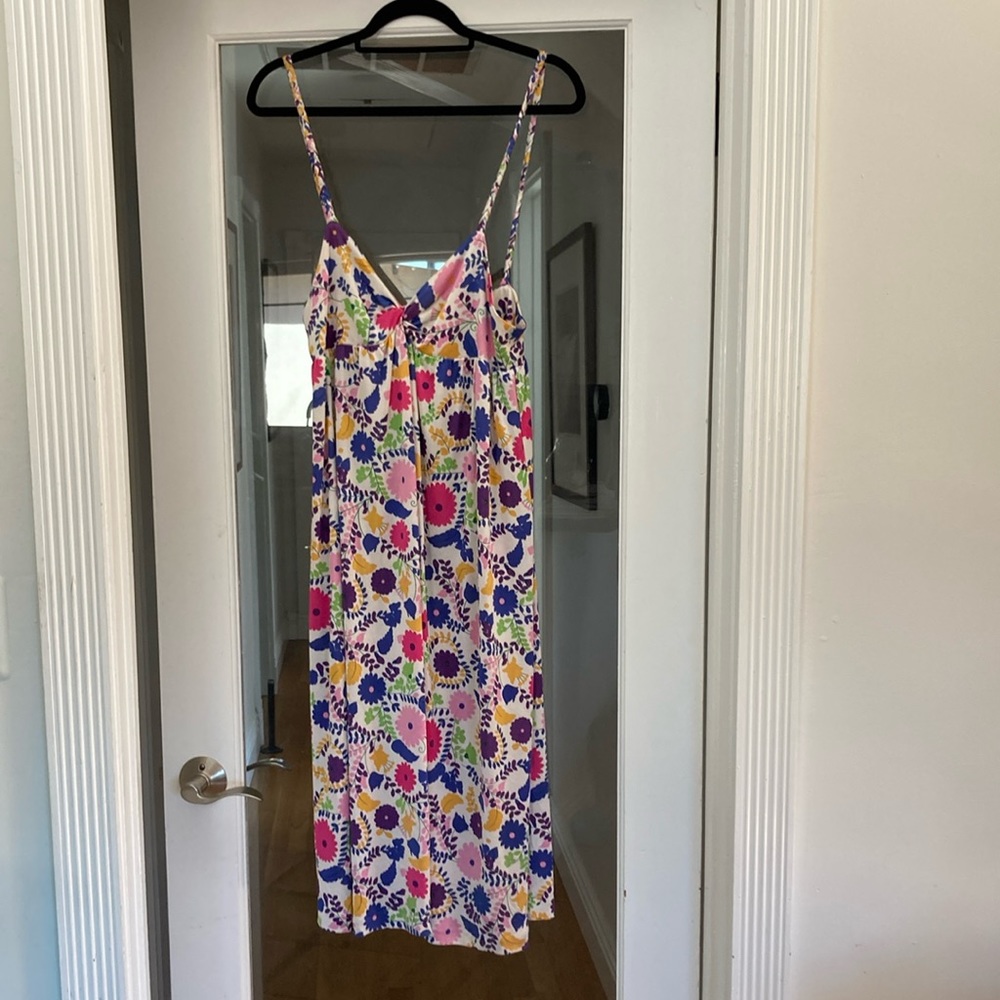 A gently used Nieves Lavi New York, 100% silk dress